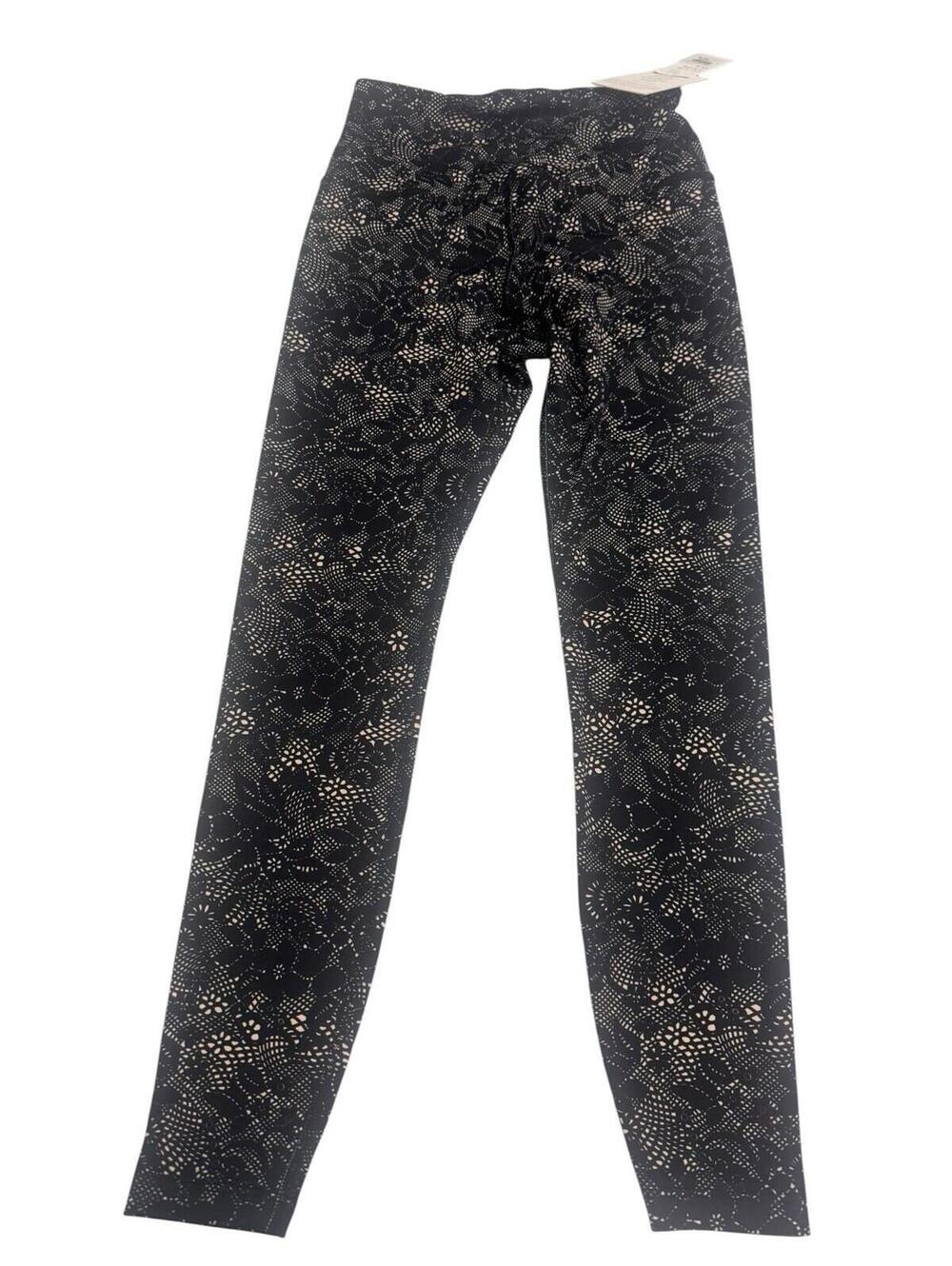 Beyond Yoga high-waisted leggings in a black and white lace print, Size M